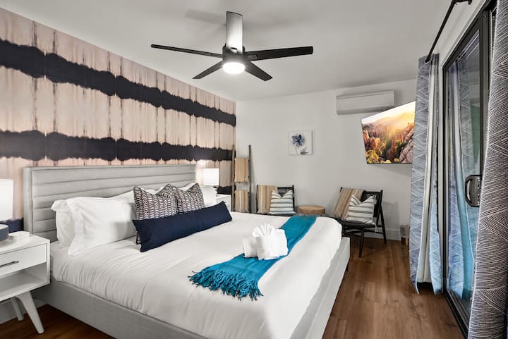 Bedroom 3 with King bed and private slider to pool level paver deck. This slider has huge Red Rock views.