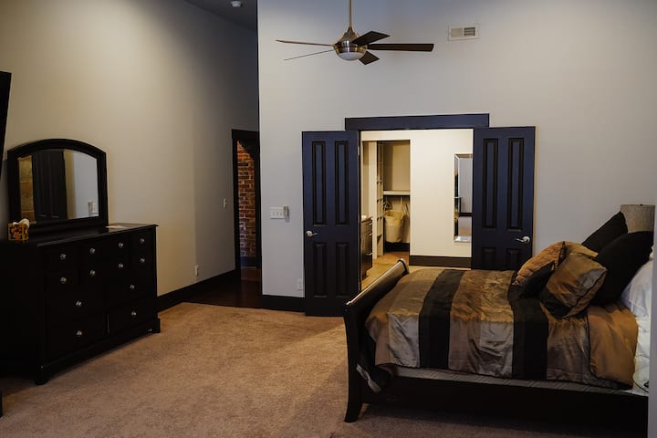 The massive 1000 sq ft Master Suite is awesome - and photos do not do it justice. Equipped with a king bed, couch, new TV, desk and work space, everything is upscale. It is a hideaway within a hideaway!