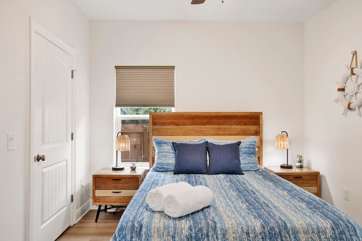 {GUEST BEDROOM} Is a cozy retreat located on the 1st floor, featuring a plush Queen bed, soft linens, ample storage, and a smart TV for streaming your favorite shows. It’s a perfect space for guests to unwind and feel right at home.