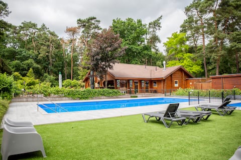 StayatSas luxury TinyHouse Pippa on large pond