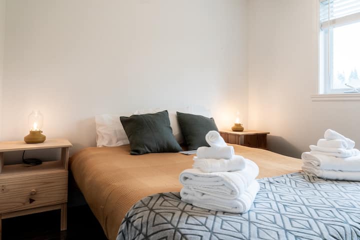 1 of 4 bedrooms with queen bed, this one located upstairs