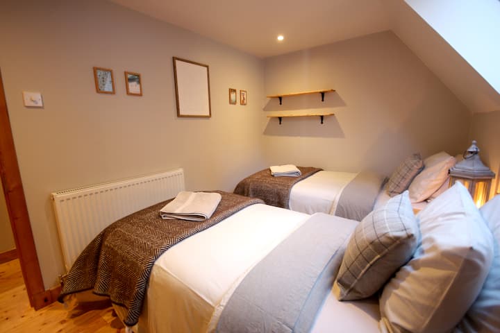 The bedrooms are cosy nooks, with soft lighting and luxuriously comfy bedding.