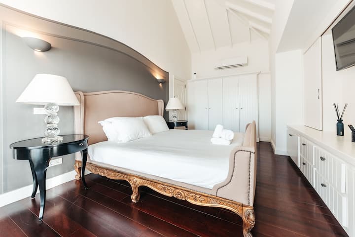 Master bedroom | Featuring a king-size bed, TV and ensuite bathroom