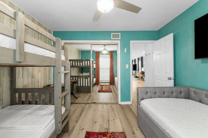The bunkbed room also includes clothing storage and a large smart TV.  Beach towels are in the closet for your use. 