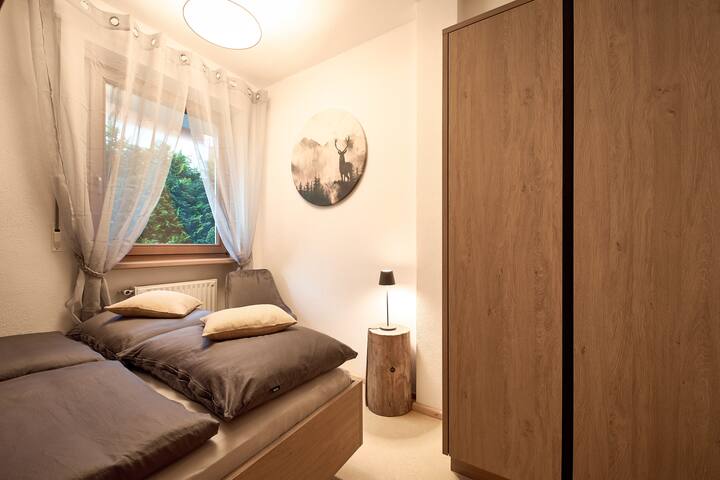 Соба погодна за семејства со практичен кревет на спрат.