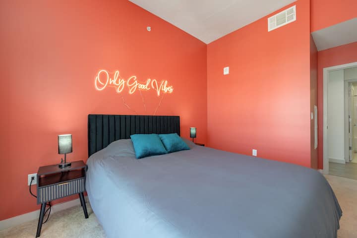 Only Good Vibes in this bedroom with a comfy queen bed