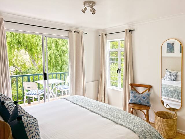 Chic 2BR Retreat | Pool + Balcony Near the Beach gallery image 5