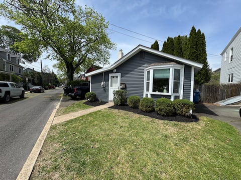 The Little House on Wood St in the center of town