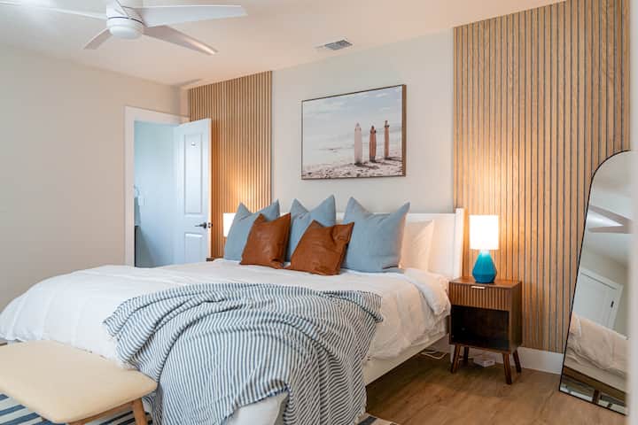 King bed in master suite with bathroom