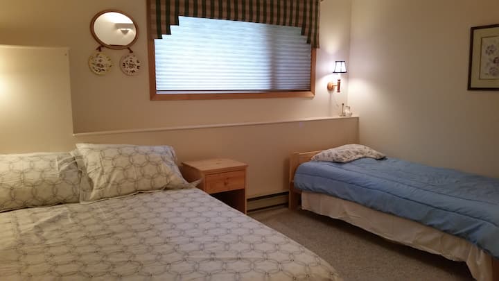  Cozy guest room with space for the whole crew—ideal for kids or friends.