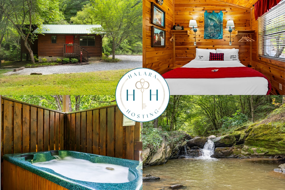 A charming cabin is situated among lush greenery, featuring a welcoming front view with a gravel path. The interior showcases a comfortable sleeping area with a queen bed and natural wood paneling. An outdoor hot tub offers a relaxing spot, surrounded by wood fencing and nature.
