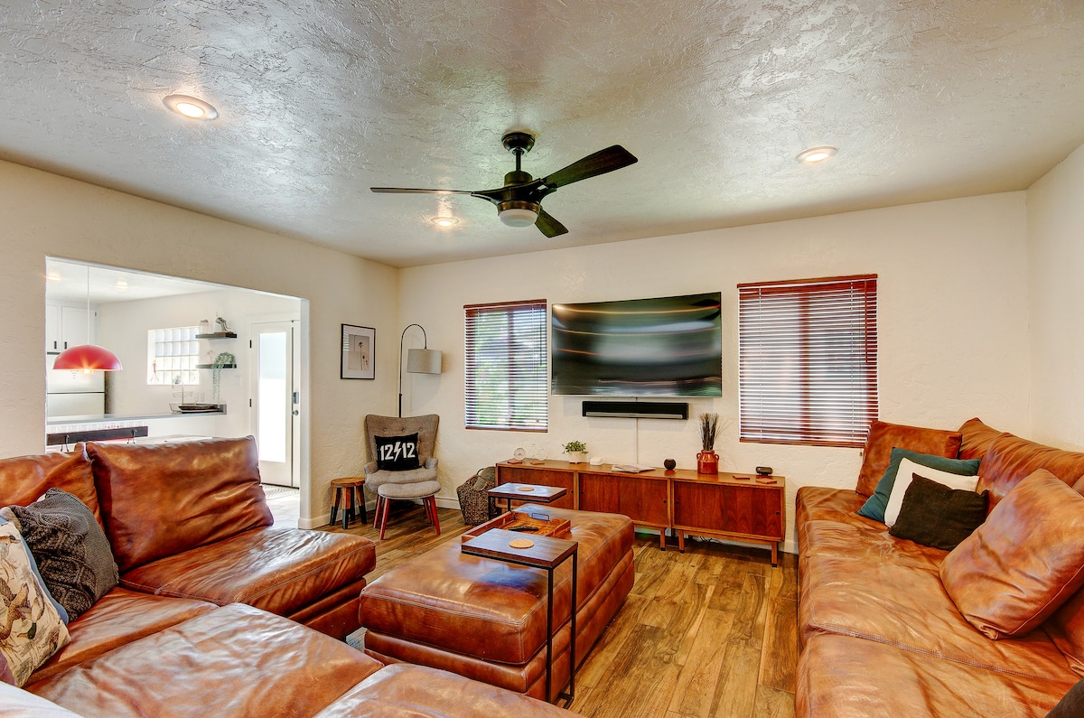 Sink into our large, comfy couch, perfect for relaxation after exploring. Whether you're curling up with a book or enjoying a movie, you'll find comfort and style in our inviting living space. Make yourself at home!