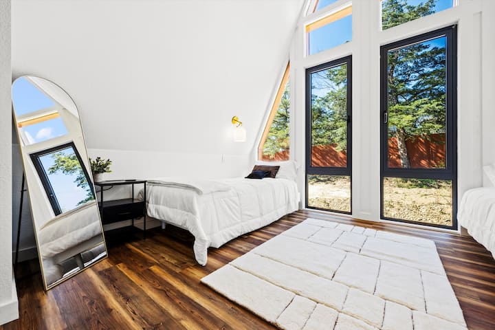 Simple comforts and style meet in this serene sleeping space.