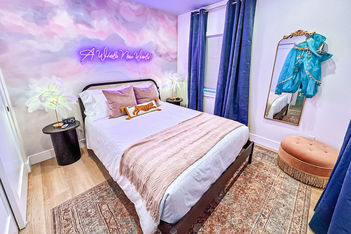  Neon nights, sky-high vibes, and a queen bed fit for royalty.