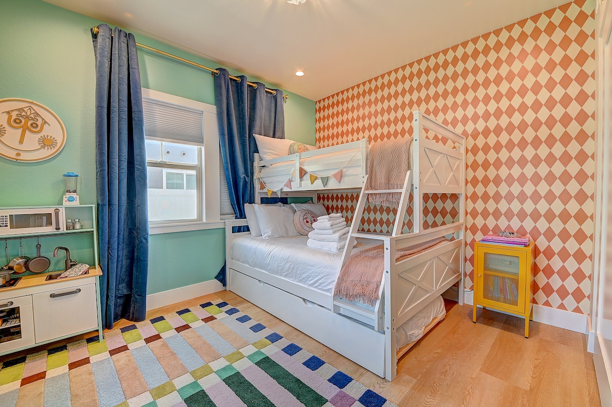  From world travels to tea parties, this room inspires imagination (and maybe a few plastic cupcakes).