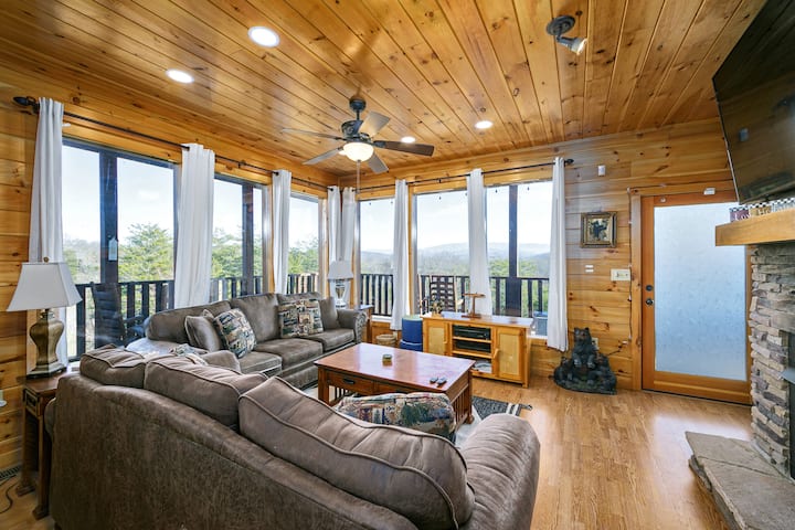 First level seating with gas fireplace, large screen Smart TV, open concept and incredible views