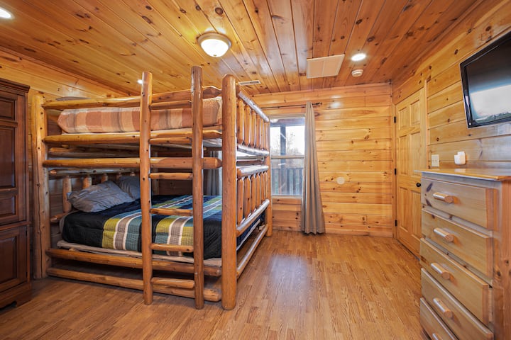 Bedroom with bunk beds and gaming decor 