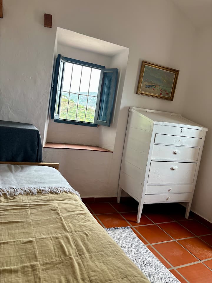 Third bedroom in the Guest House. Single bed. Accessed through the master bedroom. Often used by guests as a dressing room.