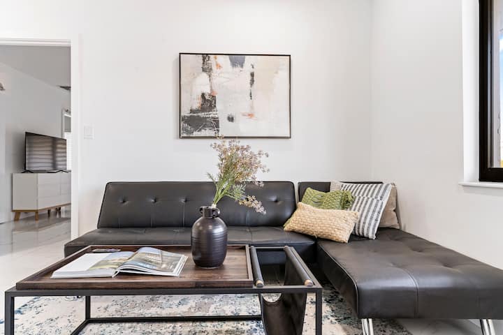 Make yourself at home in this inviting living area, perfect for relaxation and fun. ️ Whether it’s movie night or a chill hangout, this space is ready for you. How do you like to unwind after a day of exploring? Let us know!