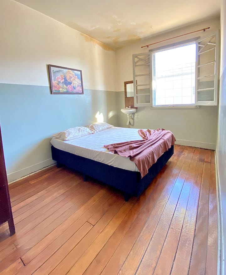 Bedroom with shared bathroom