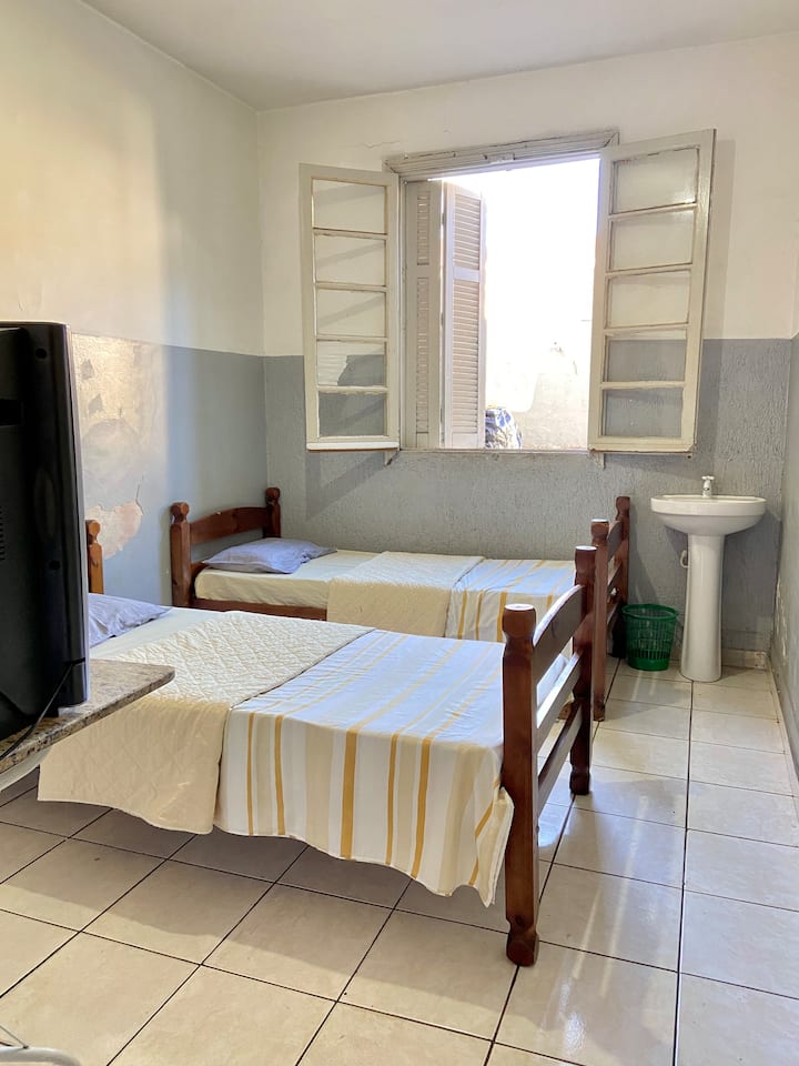 Bedroom with shared bathroom