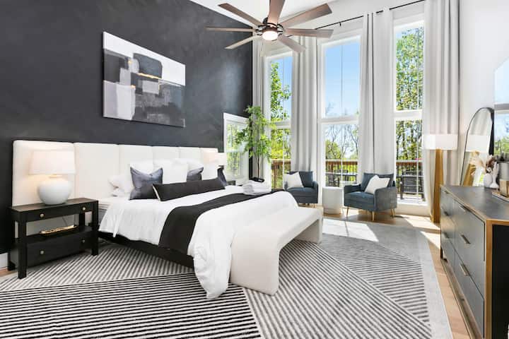 Indulge in the ultimate comfort in our master bedroom. The soaring ceilings, floor-to-ceiling windows, and plush king bed create a luxurious retreat. Enjoy the serene mountain views and unwind in this beautifully designed space, your personal haven.