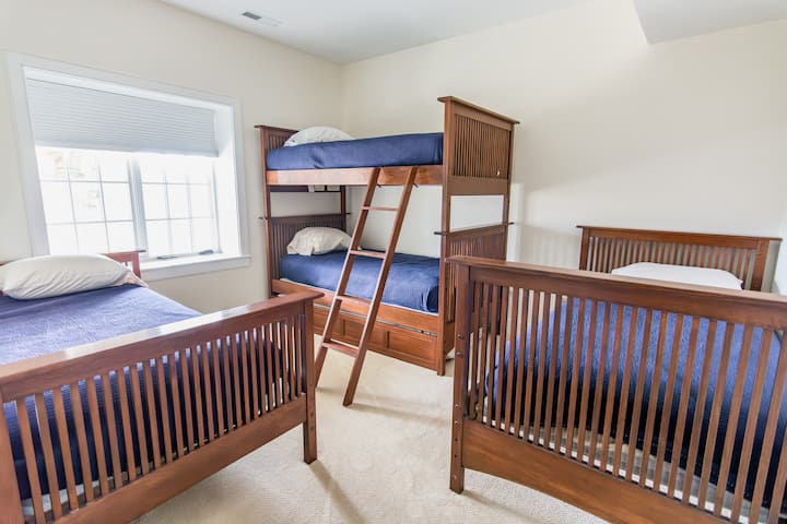 Downstairs bunk room has 2 sets of bunks (4 twins total)