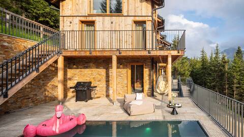 Luxury alpine chalet with heated pool