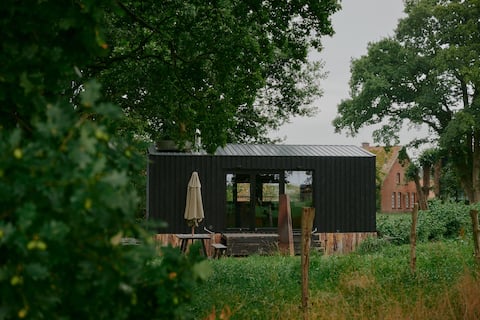 Raus | Cabin near farm with sheep and chickens
