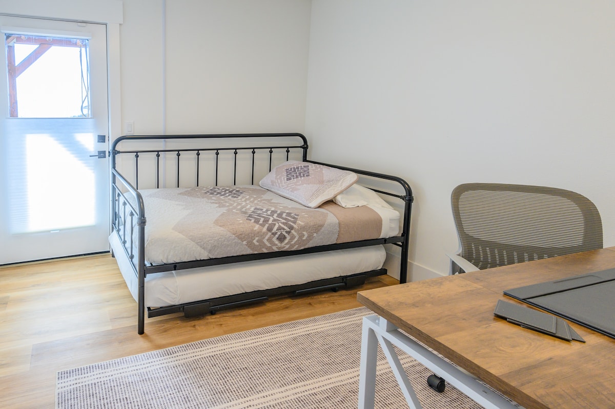 Comfortable bedroom with a trundle bed—perfect for kids, friends, or extra guests, making it easy to sleep two without sacrificing space.