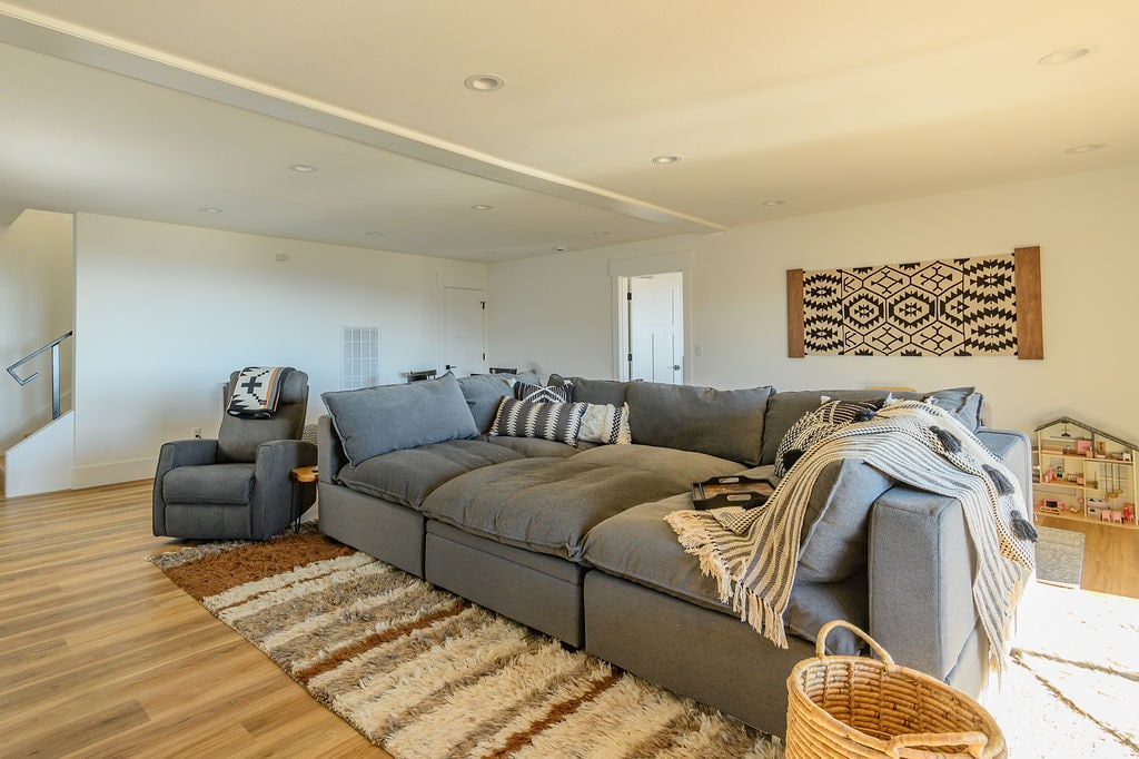 The main living area has it all! Just off the kitchen, relax in style in our modern living room with a touch of southern charm.