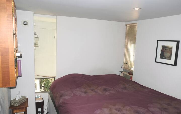 Camera al piano superiore con letto king size