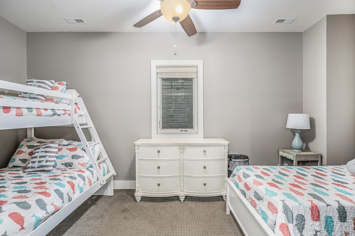 Kids Bunk Bed Twin over Double and a Twin Bed offer plenty of sleeping space for families or friends.
