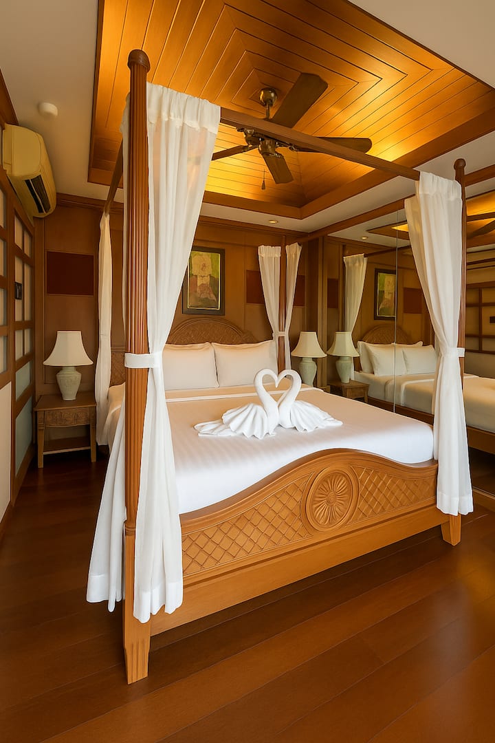 Luksuzna spavaća soba s ručno izrađenim krevetom s baldahinom, blagom rasvjetom i toplim drvenim detaljima. Romantičan i miran prostor osmišljen za vrhunsku udobnost