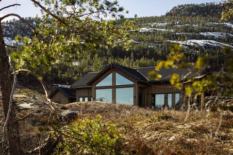 Villa Lakehouse Moss met sauna, boot & jacuzzi
