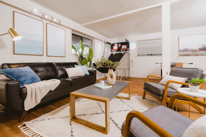 A second, spacious lounge area downstairs—perfect for a 'kids' zone' or a quiet escape for the adults.