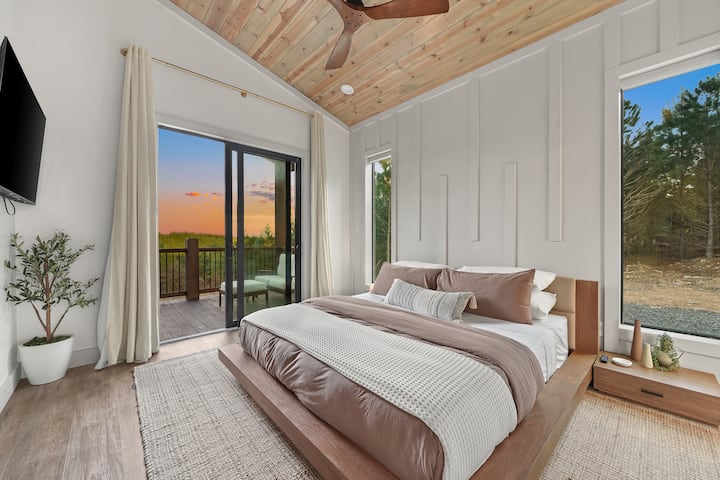 Bedroom Oasis: Wake up to stunning views and stylish decor in this serene retreat!