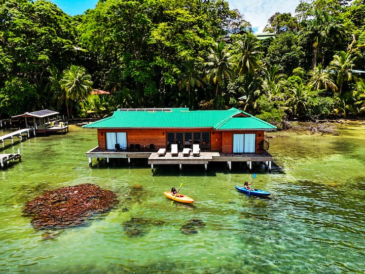 Eco-Luxury Overwater Villa • SUPs • Kayaks • A/C