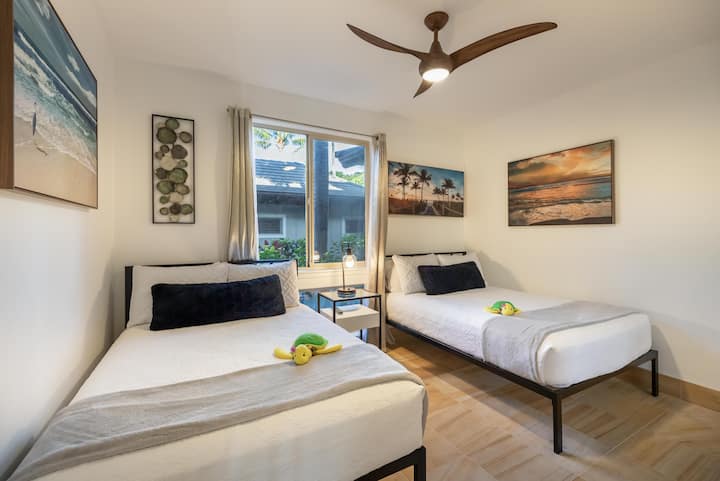 Quarto de hóspedes no andar de baixo com 2 camas completas
