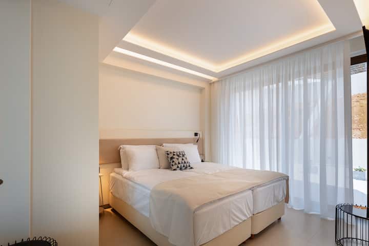 The bedroom of the Vita home residence of the villa