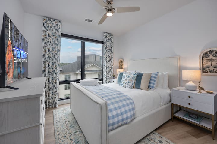 A comfortable guest bedroom with warm design and cozy bedding. Perfect for couples, friends, or family to sleep soundly and wake ready for Nashville adventures.