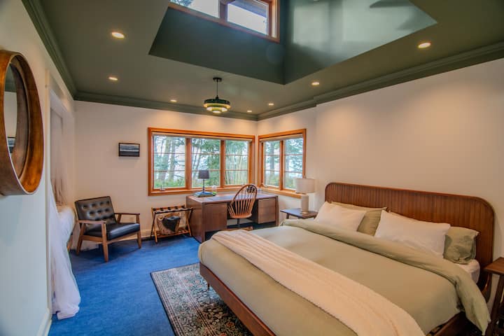 Third bedroom with king bed, single bed in cozy nook and spacious desk.  Workspace has inspiring views for work from home meetings, creating art or daydreaming.