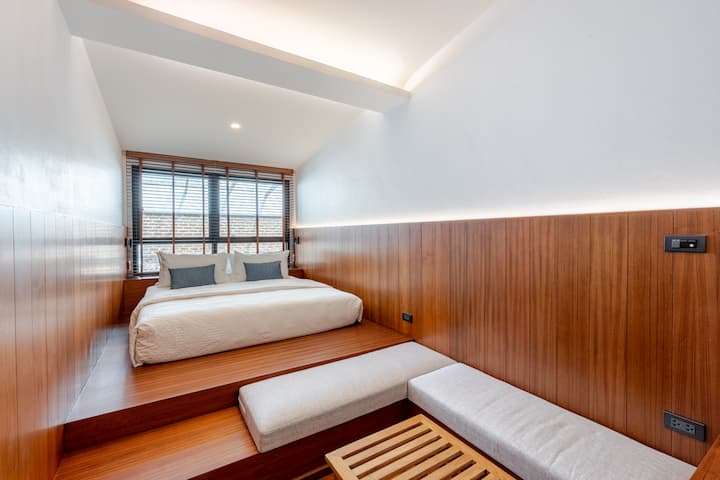 Although a compact bedroom, the space is utilised well, with king sized mattress and small seating area when you or your guest needs to take some private time away from the group.