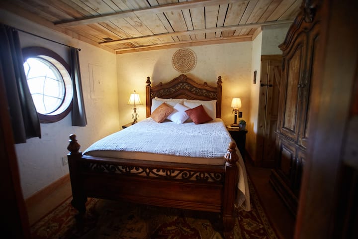 enjoy the charming old world style of our halfling bedroom. It's a Zinus Green Tea memory foam  mattress.  Guest love it.