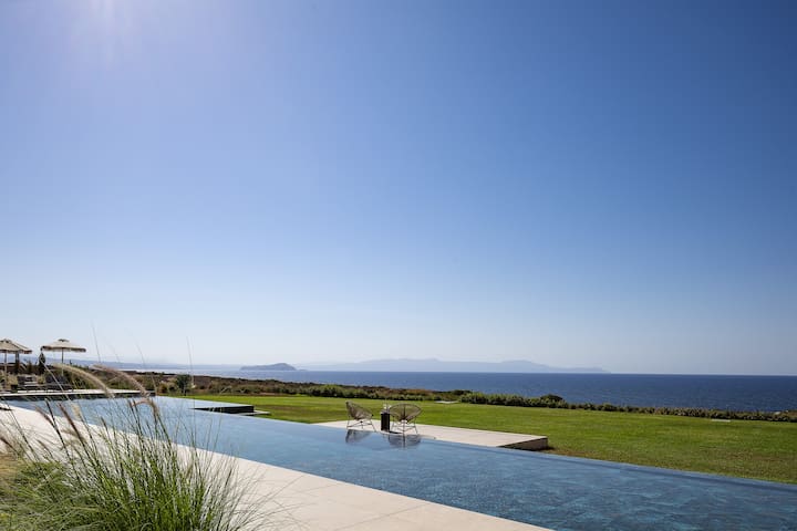 Single-Level Elegance: Enjoy Sea & Sunset Views