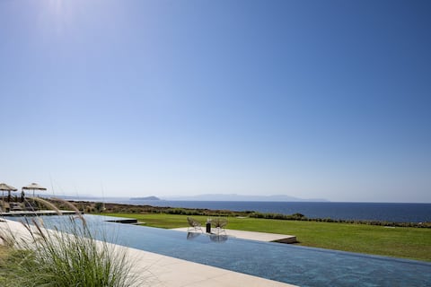 Single-Level Elegance: Enjoy Sea & Sunset Views