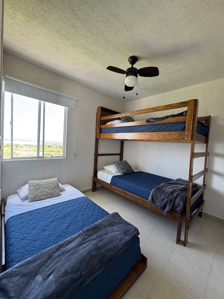 Recámara perfecta para familias o grupos: una cama individual y litera doble