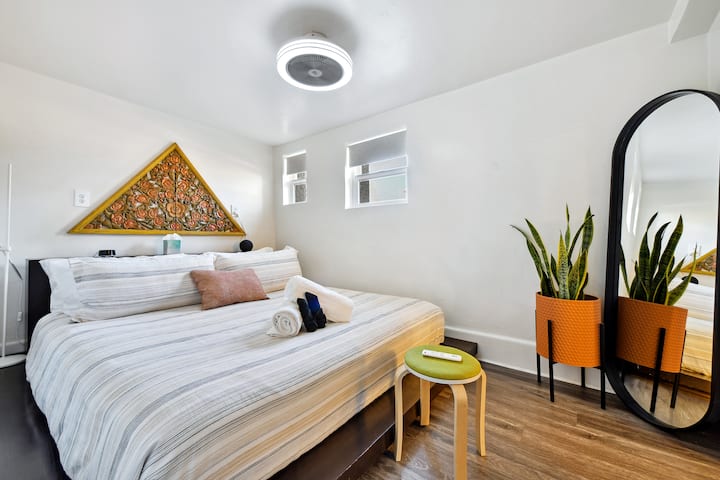King size luxury bed in the back bedroom
