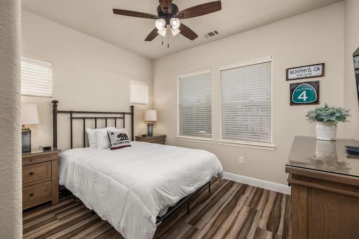 Bedroom 2 with Queen bed,  43" smart TV, and large closet 