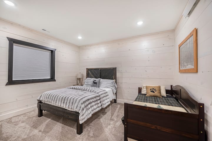 Downstairs queen room with twin trundle bed (sleeps 4)